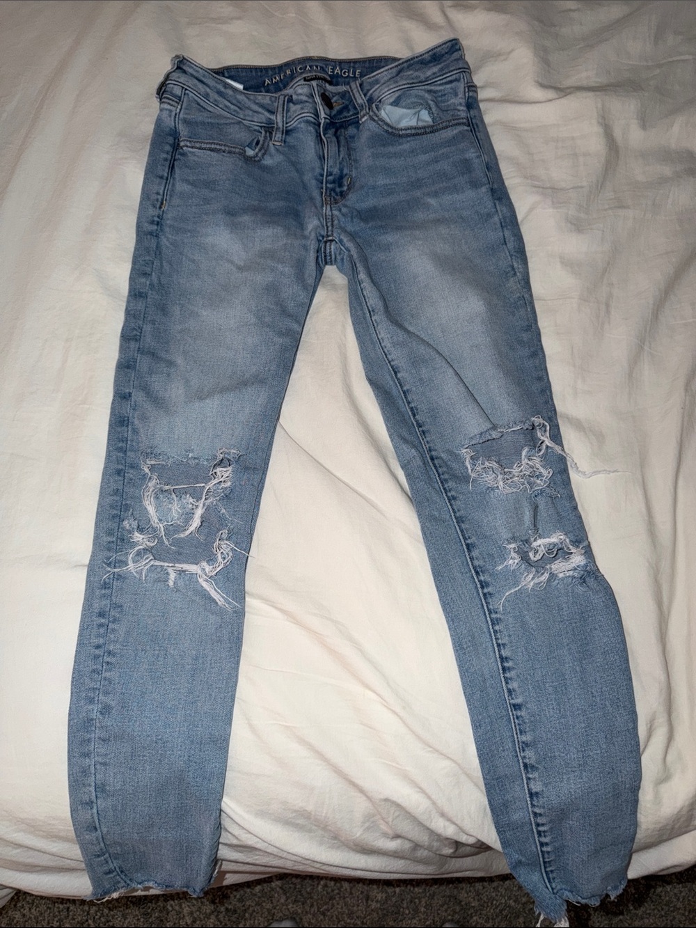 American Eagle Outfitters Light Blue Distressed Super Stretch Skinny Jeans